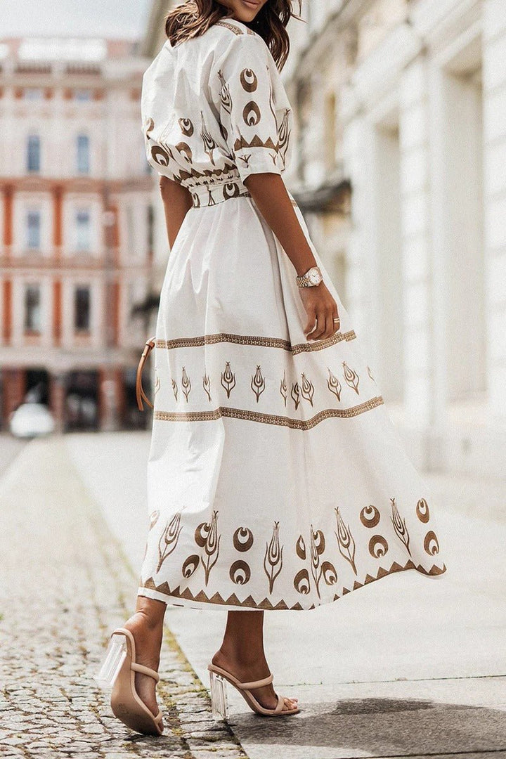 Green women's casual midi dress, A-line cut with a beautiful boho print and adjustable self-tie waist.