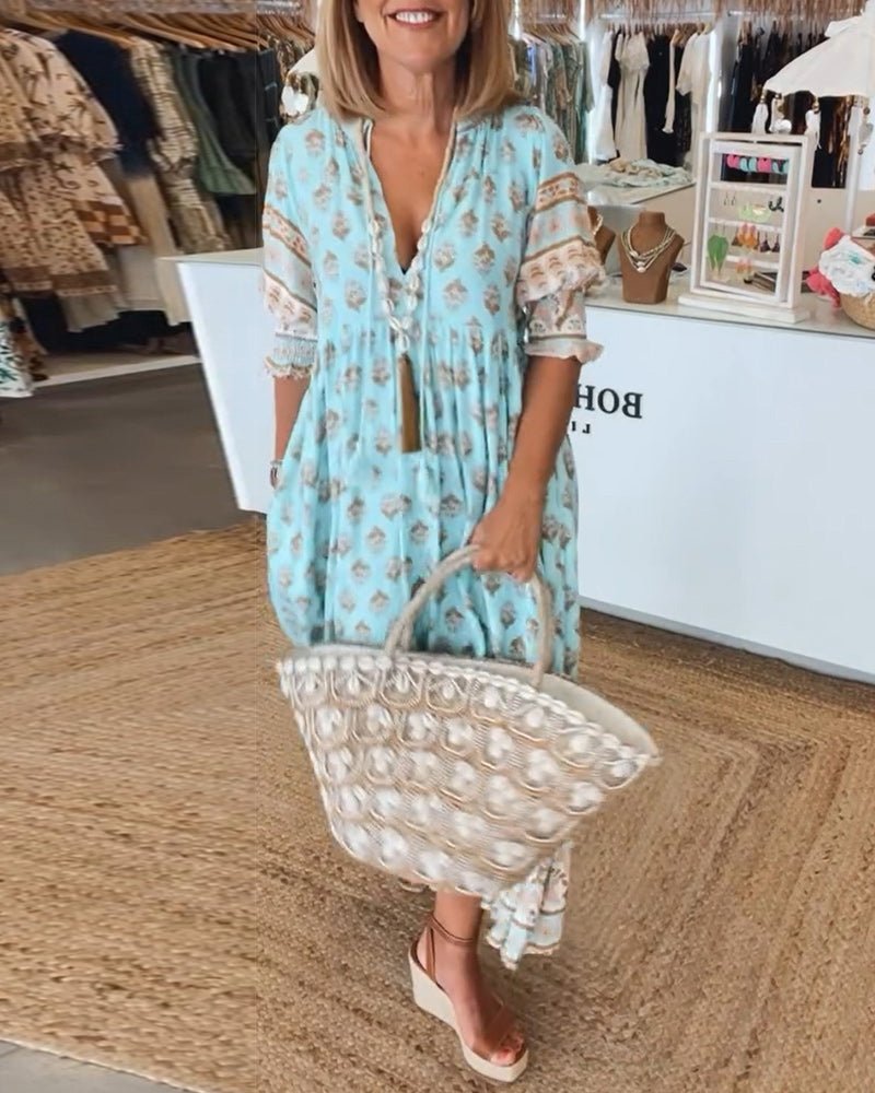 Women's boho printed midi dress with tassel tie, a stylish choice for summer casual wear and vacation.