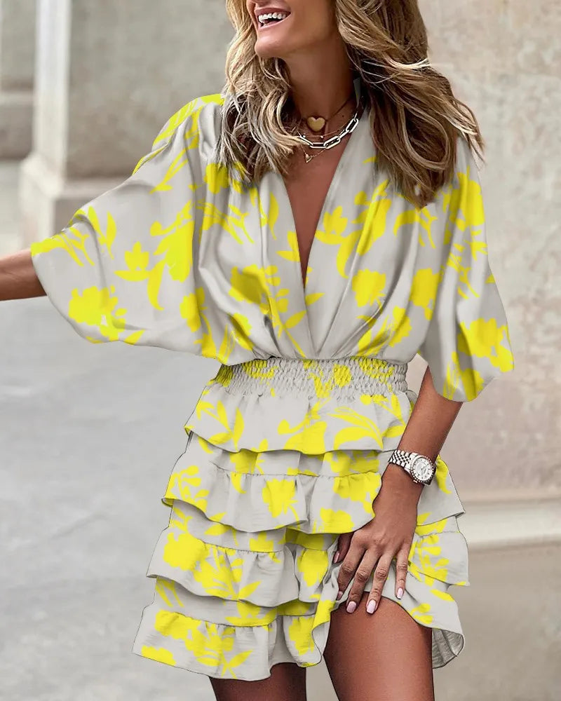 Women's boho printed ruffle mini dress with V-neck, perfect for summer casual wear or vacation.