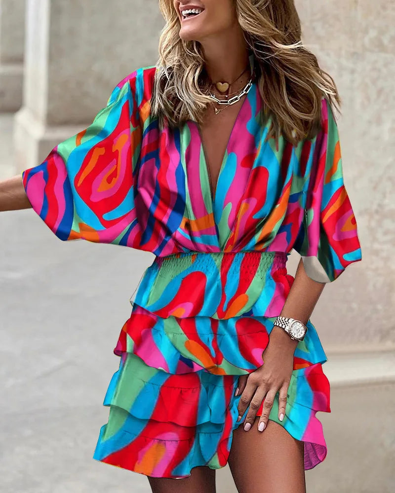 Trendy women's printed boho ruffle mini dress, a perfect casual summer staple with its chic V-neck design.