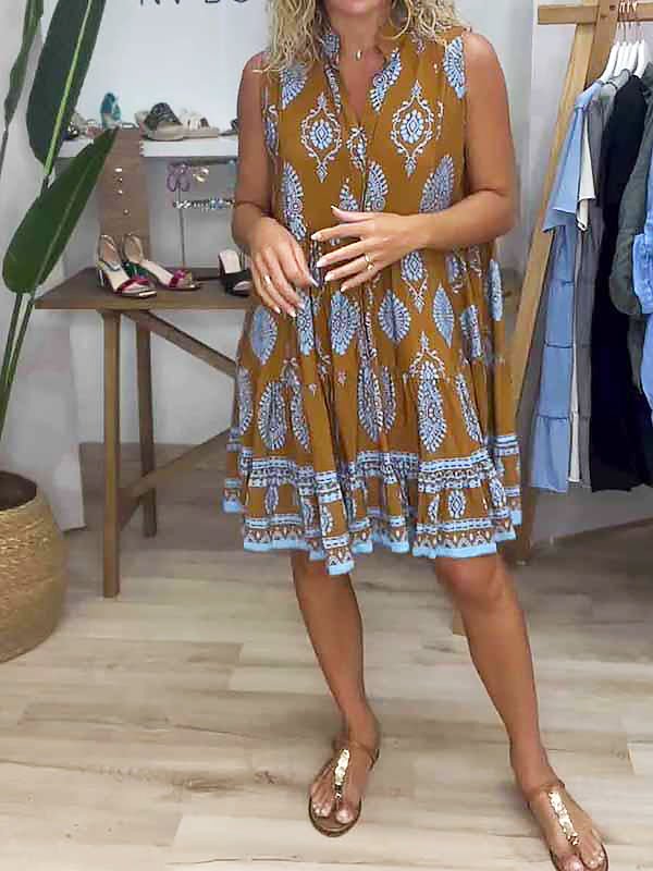 Women's boho printed sleeveless mini dress, perfect for summer casual wear or vacation outfits. Flowy bohemian style.