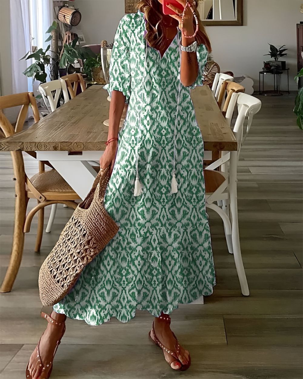 Casual women's v-neck maxi dress with a vibrant bohemian print, ideal for a comfortable summer fashion look.