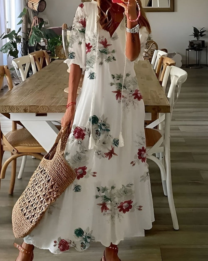 Women's casual boho printed maxi dress with a comfortable v-neck, an easy-to-wear summer and vacation outfit.