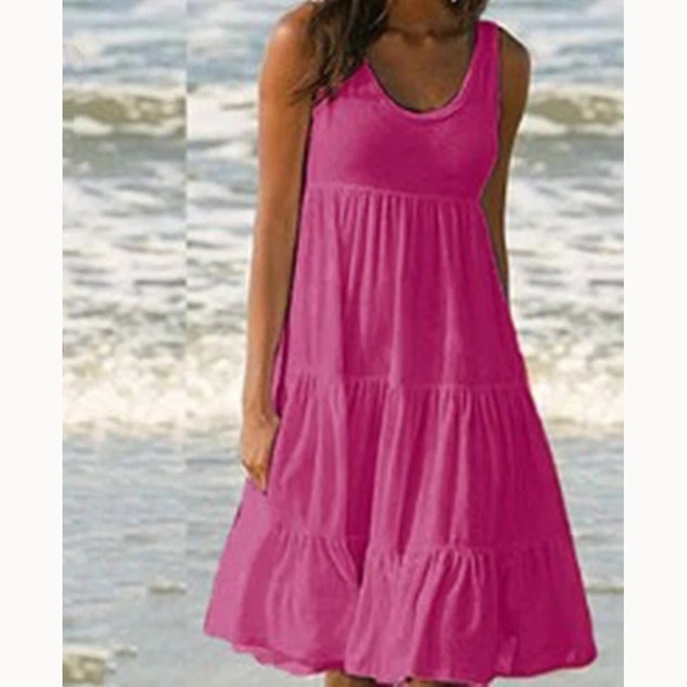 Boho vacation style: women's sleeveless tiered midi dress, scoop neck, and flowy design, great for summer fashion.