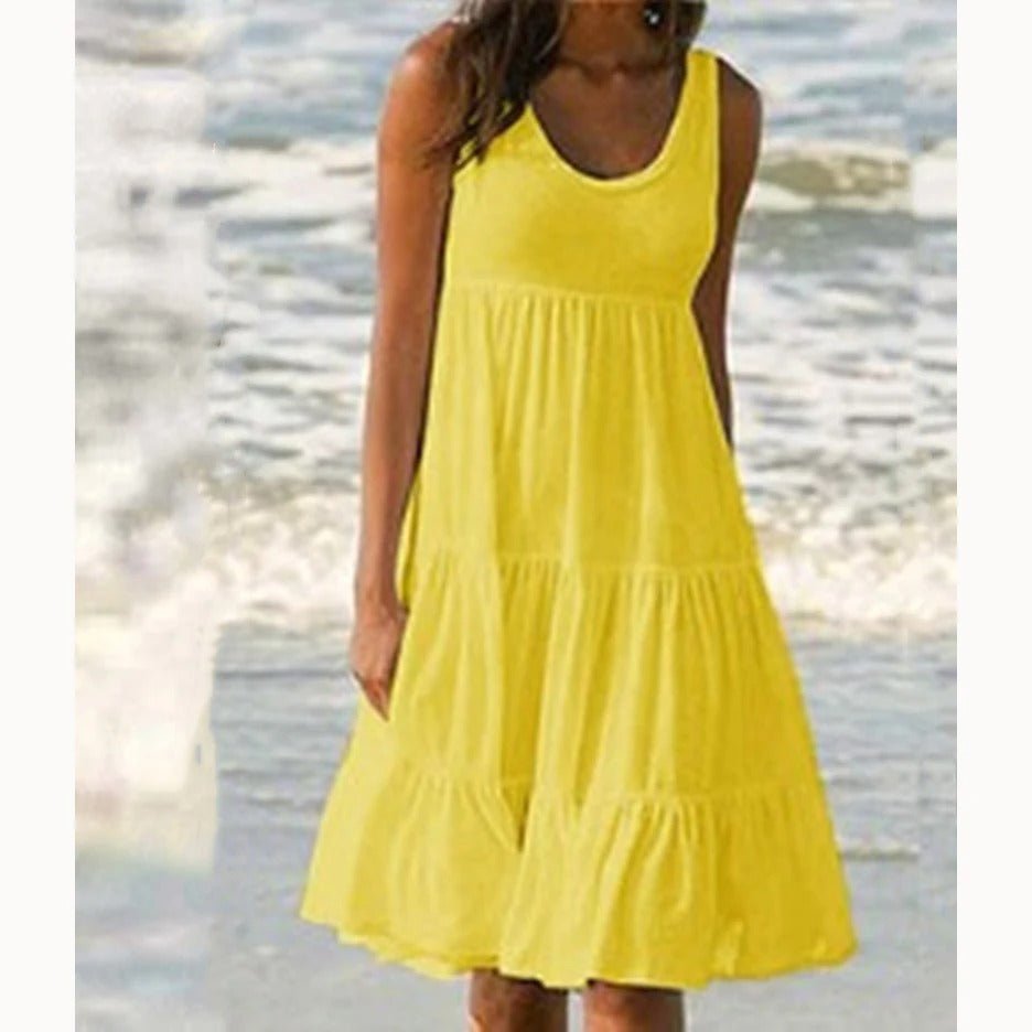 Summer scoop neck sleeveless midi dress for women. Bohemian tiered design, perfect for beach wear or casual chic.