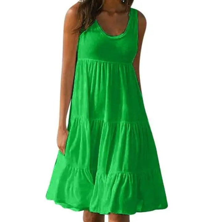 Bohemian sleeveless midi dress for women, showcasing a tiered skirt, scoop neckline, and flowy fabric for summer.