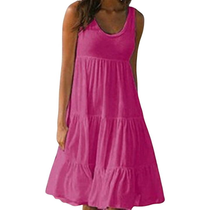 Beach ready! Women's sleeveless boho tiered midi dress with a scoop neck, flowy design for a stylish summer vacation.