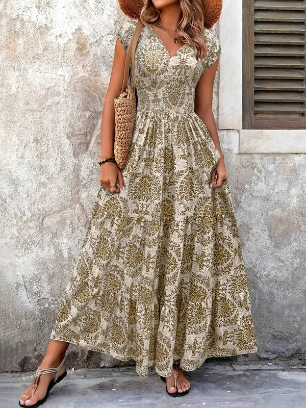 Women's Boho Smocked Tiered Maxi Dress with V-neck & cap sleeves, perfect for summer casual wear.