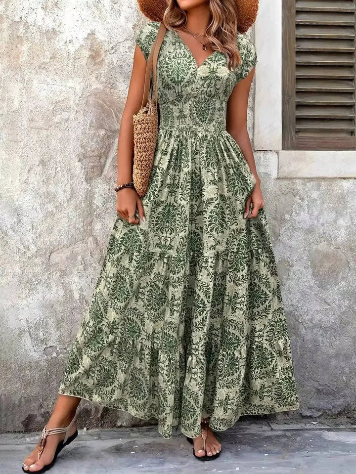 Relaxed fit smocked tiered maxi dress for women, bohemian style, comfortable summer V-neck dress.