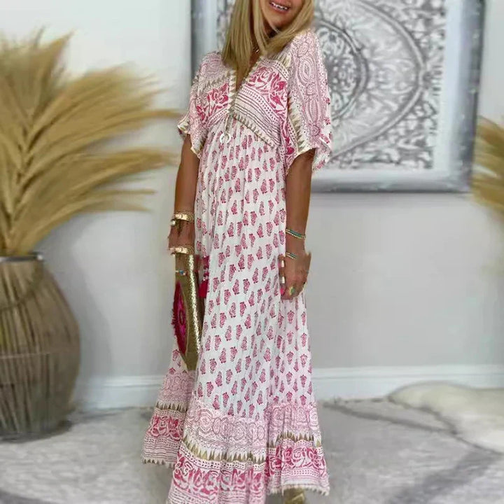 Women's boho tassel maxi dress, short sleeve & printed, perfect for casual summer style & vacation wear.
