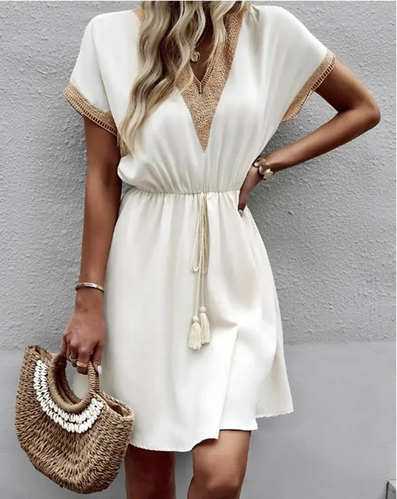 Women's boho V-neck midi dress with tie waist. Perfect for summer, flowy & chic style.