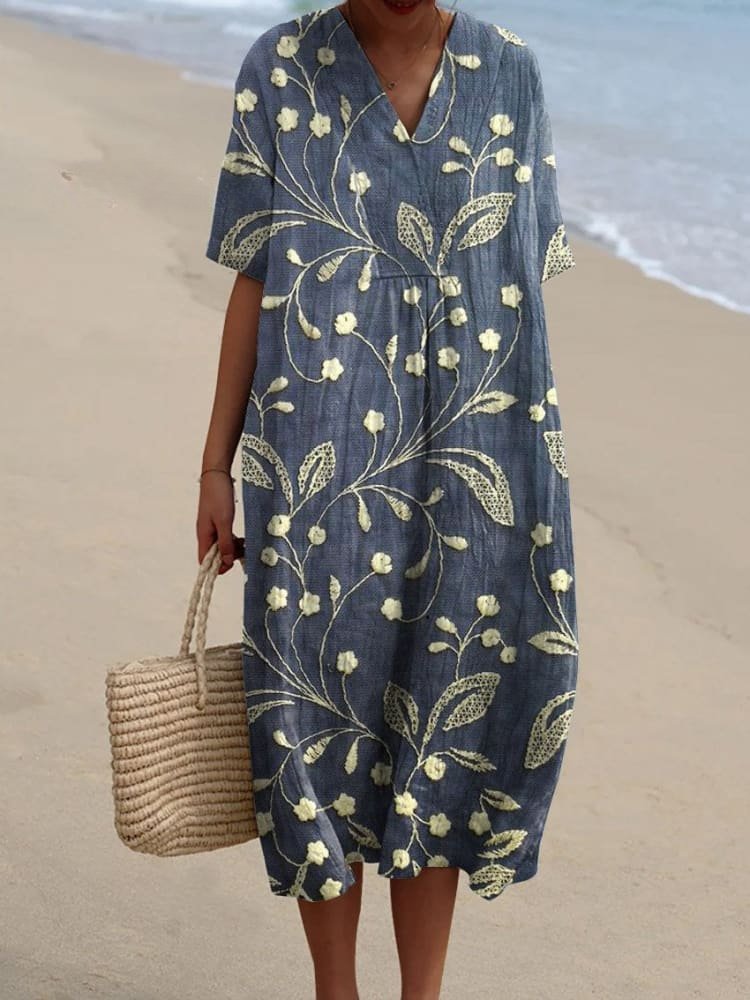 Striped V-neck midi dress for women. Relaxed fit, short sleeve Boho style for comfortable warm weather fashion.