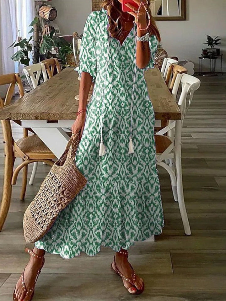 Effortless women's boho V-neck summer dress for relaxed vacation style. Flowy & comfortable.