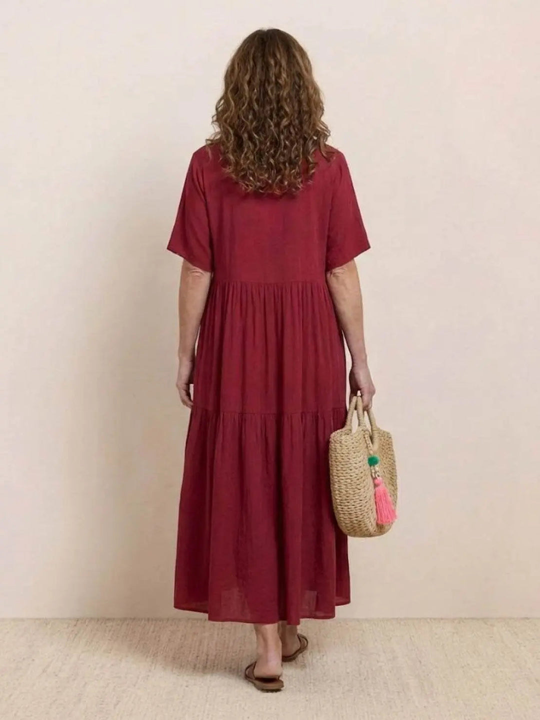 Bohemian short sleeve maxi dress, V-neck, tiered, women's casual summer ensemble.