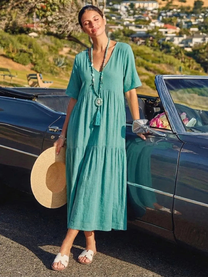 Casual summer maxi dress for women, V-neck, tiered, short sleeves, bohemian flair.