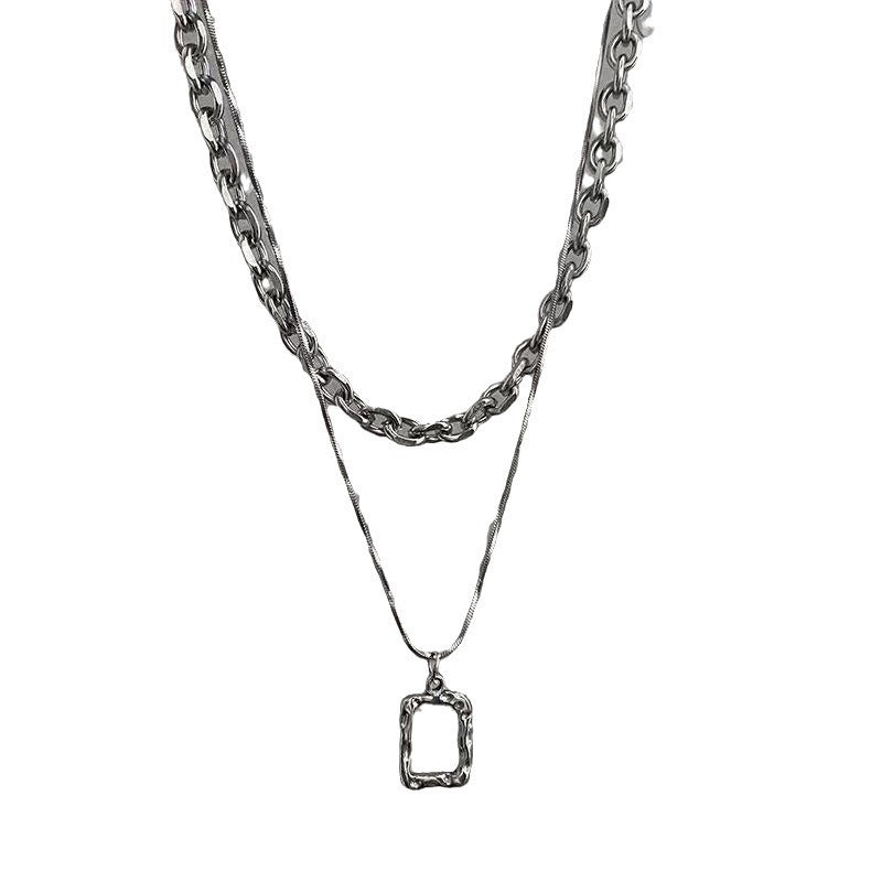 Bold women's chunky gold chain necklace with a unique rectangular pendant. Perfect trendy fashion accessory & gift for her.