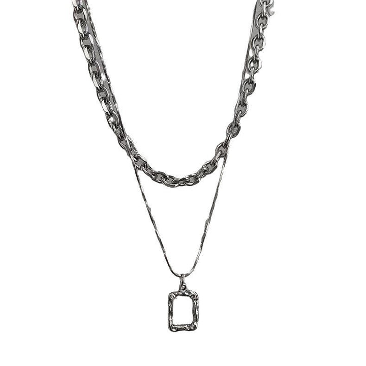 Bold women's chunky gold chain necklace with a unique rectangular pendant. Perfect trendy fashion accessory & gift for her.