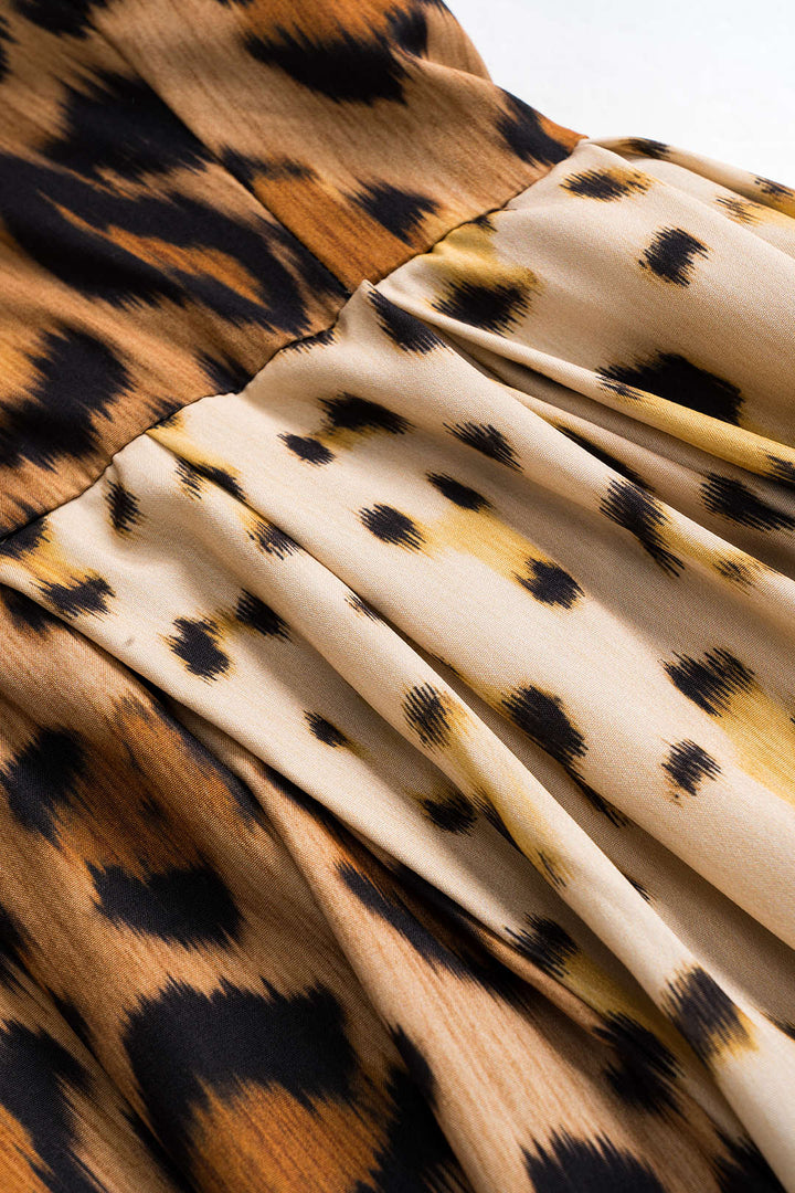 Chic women's leopard print midi dress featuring a flattering corset design and elegant silhouette.
