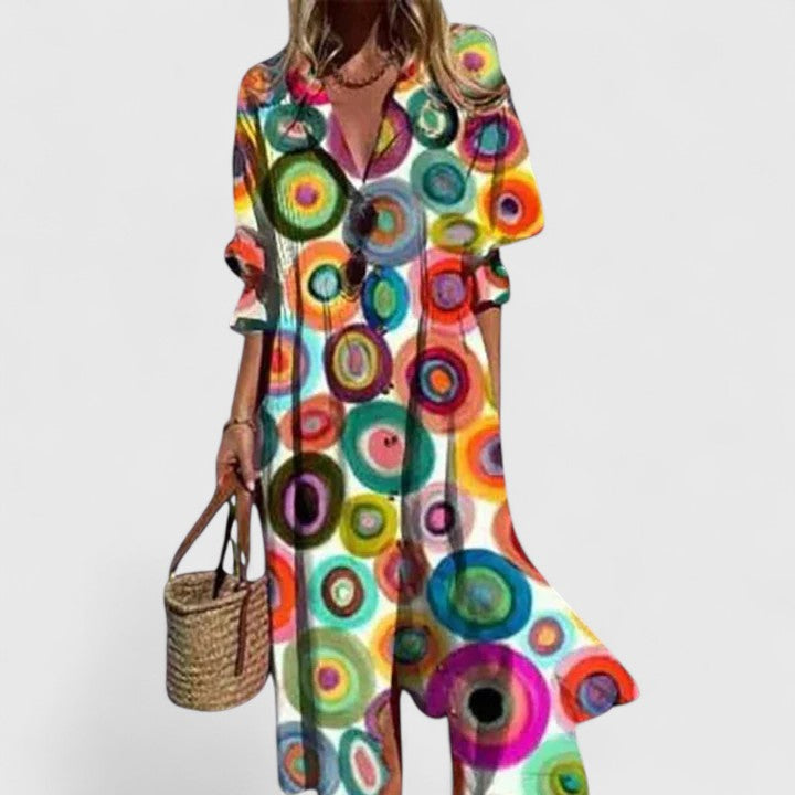 Effortless women's button-front midi dress, adorned with a lovely botanical print, for versatile wear.