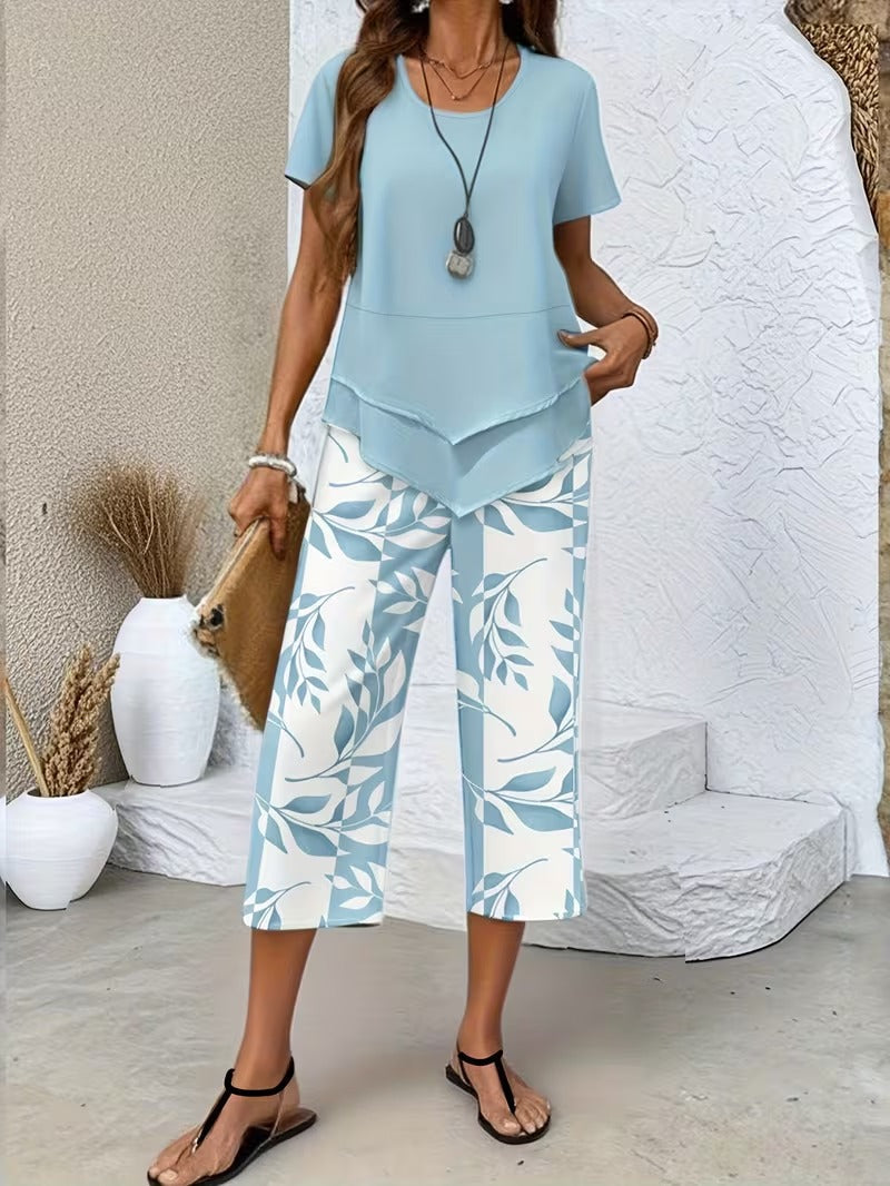 Comfortable women's floral two-piece set with vibrant botanical print, ideal for summer style.