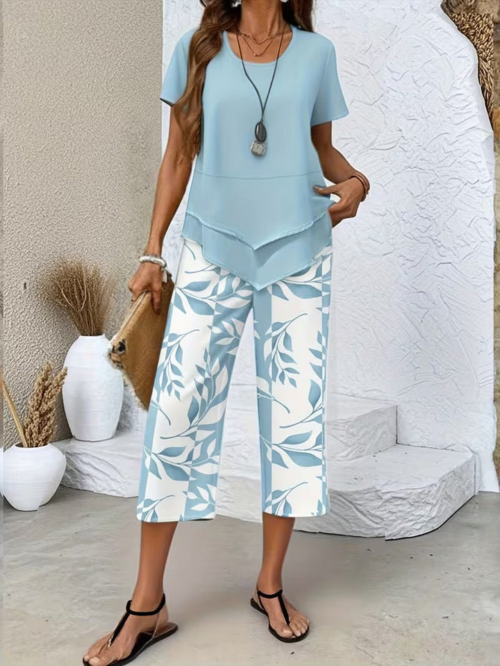 Comfortable women's floral two-piece set with vibrant botanical print, ideal for summer style.