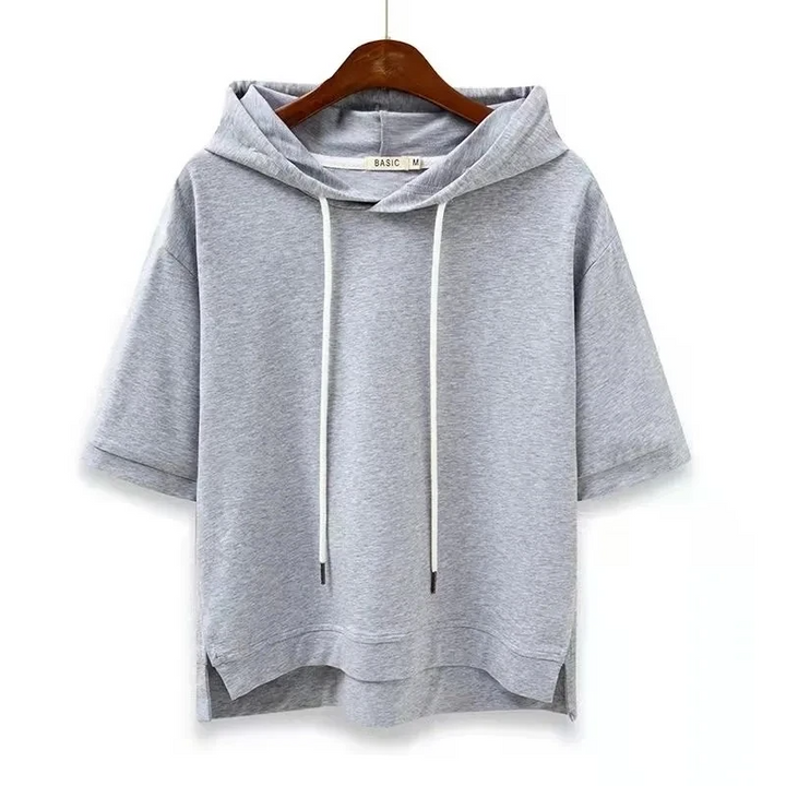 Women's boxy fit short sleeve hoodie in breathable cotton blend, perfect for relaxed casual wear & spring fashion.