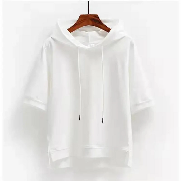 Comfortable women's boxy fit short sleeve hoodie with a stylish split hem, great for everyday relaxed fashion.