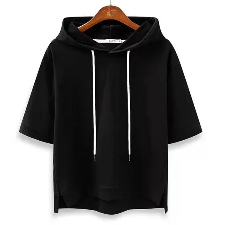 Minimalist women's short sleeve hoodie with a boxy fit, a versatile ladies top for comfort and casual wear.