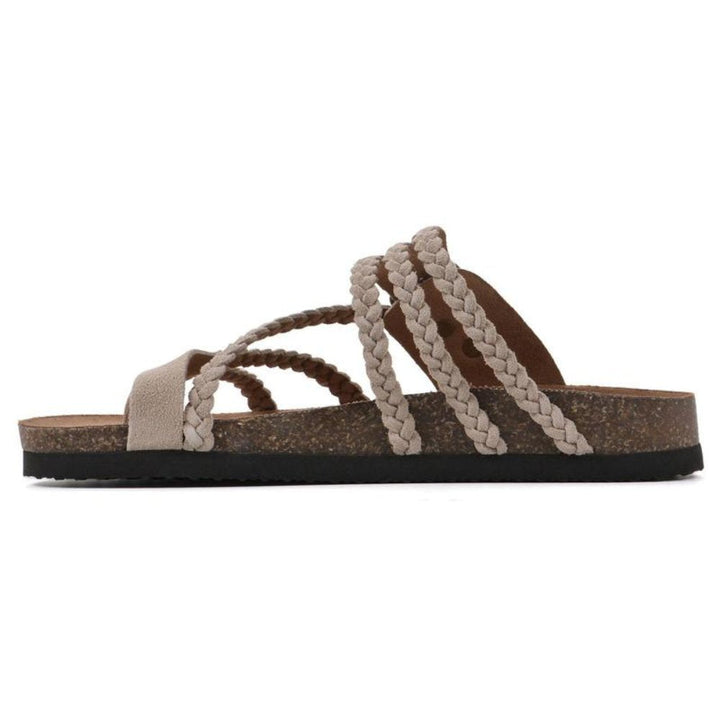 Everyday women's braided sandals featuring a buckle closure and toe-loop. Essential for summer holidays.