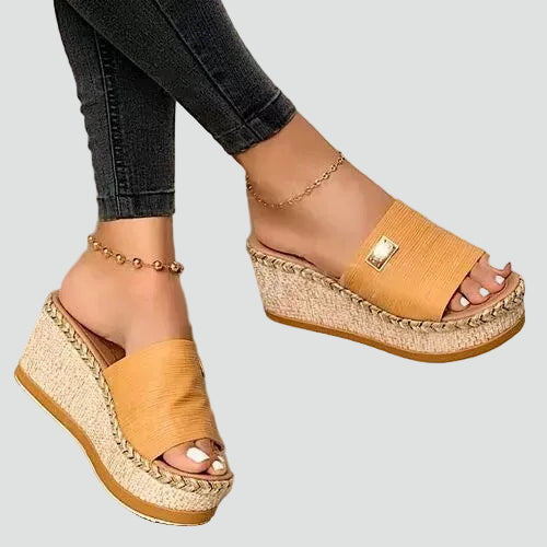 Chic women's braided platform wedge slide sandals. Open toe design for casual summer style, comfortable everyday footwear.