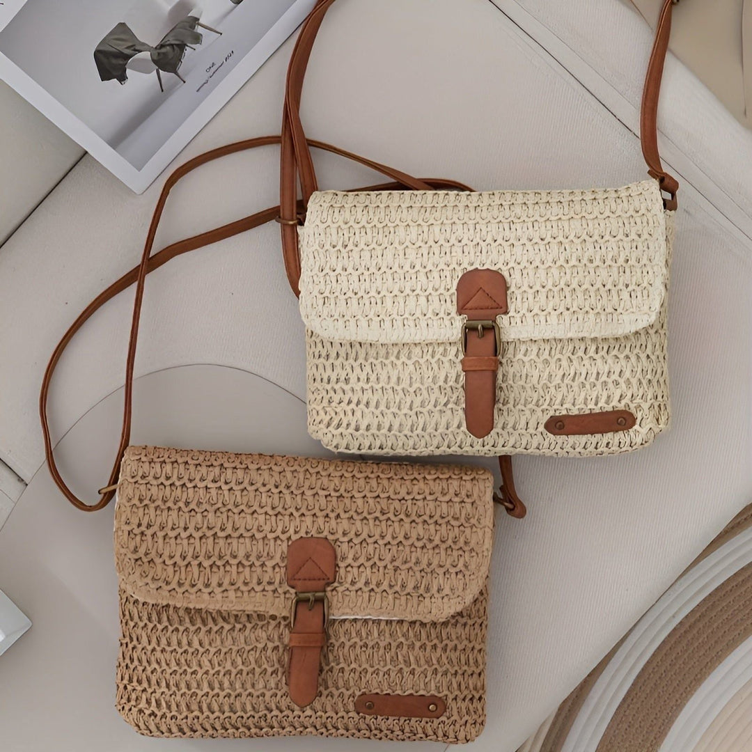 Women's elegant braided straw summer shoulder bag. Adjustable strap. Chic beach & holiday accessory.