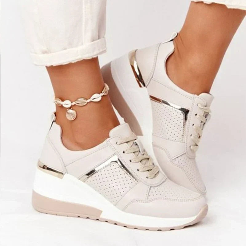 Women's breathable comfort sneakers in a neutral color, offering all-day support for walking & everyday wear.