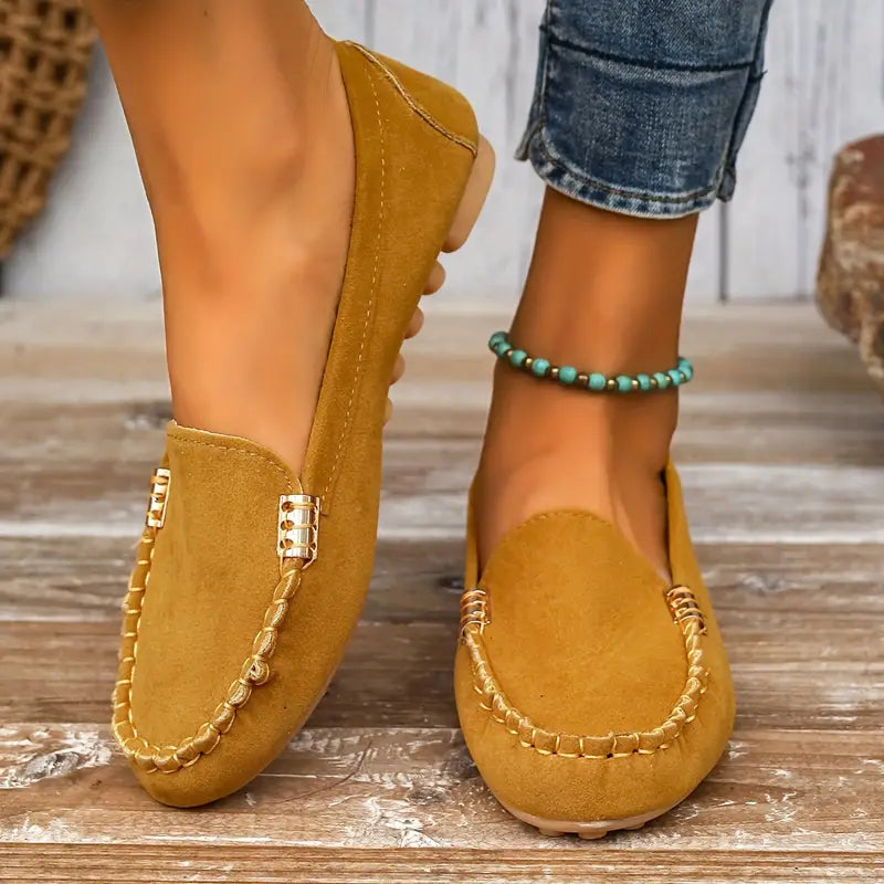 Fashionable women's casual slip-on flats worn on foot, ideal for everyday style and effortless comfort.
