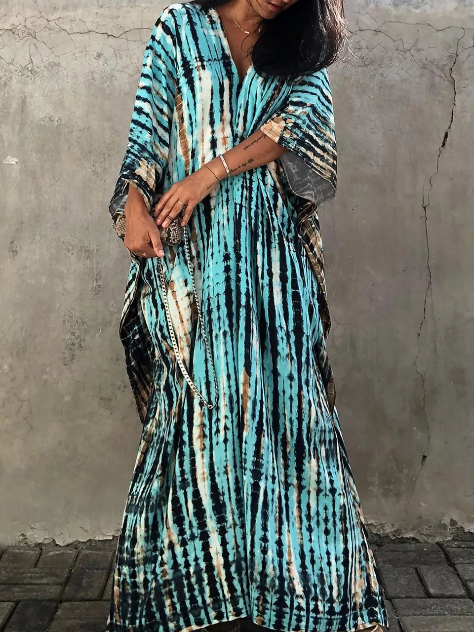 Comfortable women's flowy caftan dress, a relaxed fit maxi for warm weather.