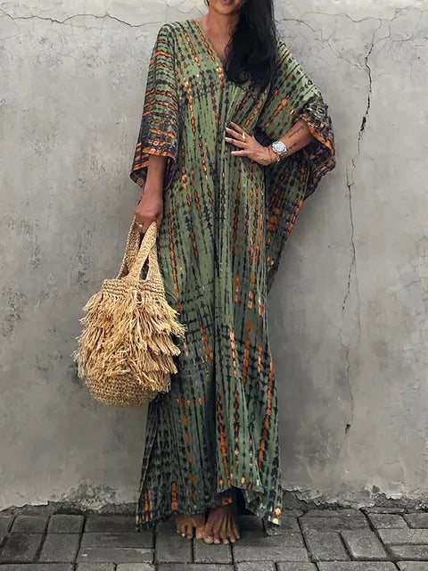 Vacation-ready women's caftan maxi dress, offering relaxed comfort and style.