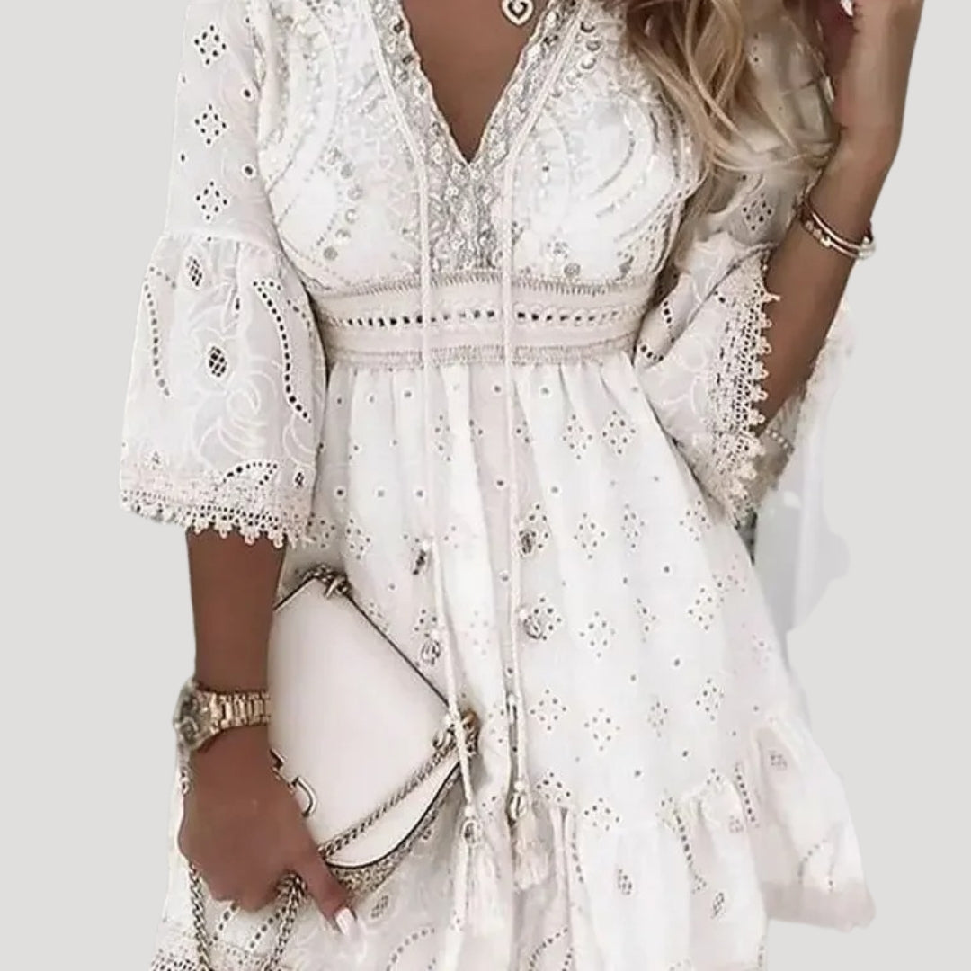 Casual women's boho mini dress, breezy and comfortable, ideal as a summer dress or beach cover-up.