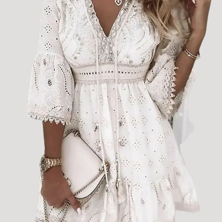 Casual women's boho mini dress, breezy and comfortable, ideal as a summer dress or beach cover-up.