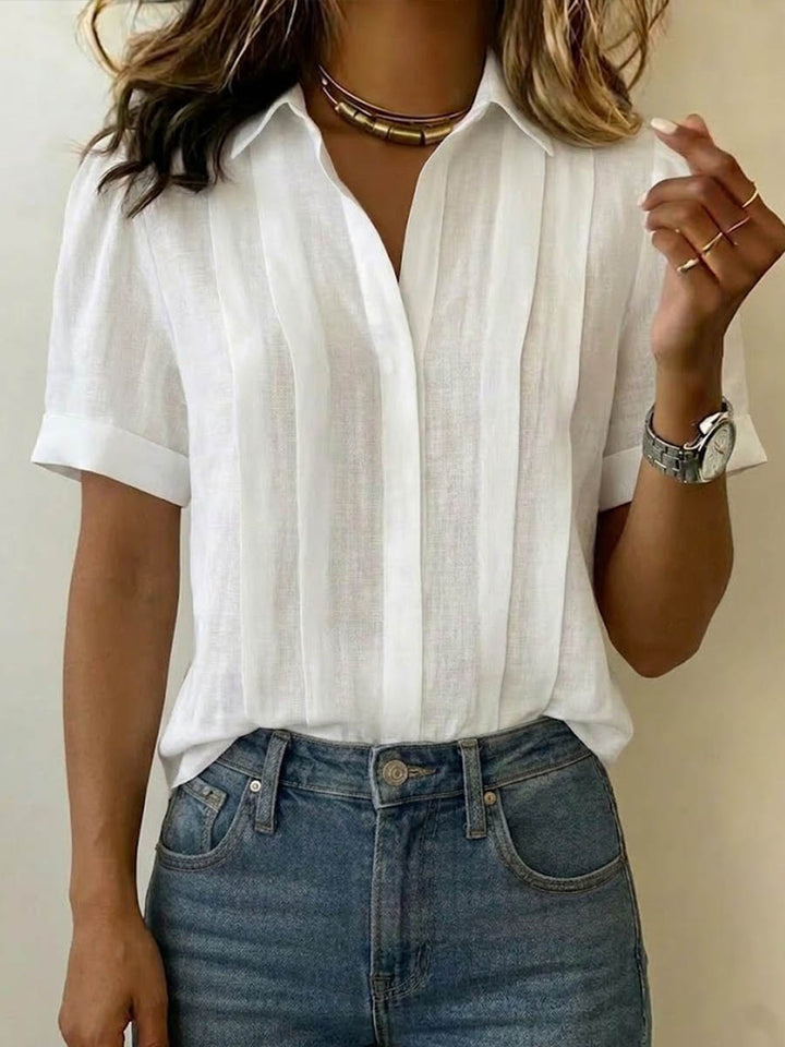 Women's breezy short-sleeve blouse for effortless style. Perfect for summer fashion & everyday wear.