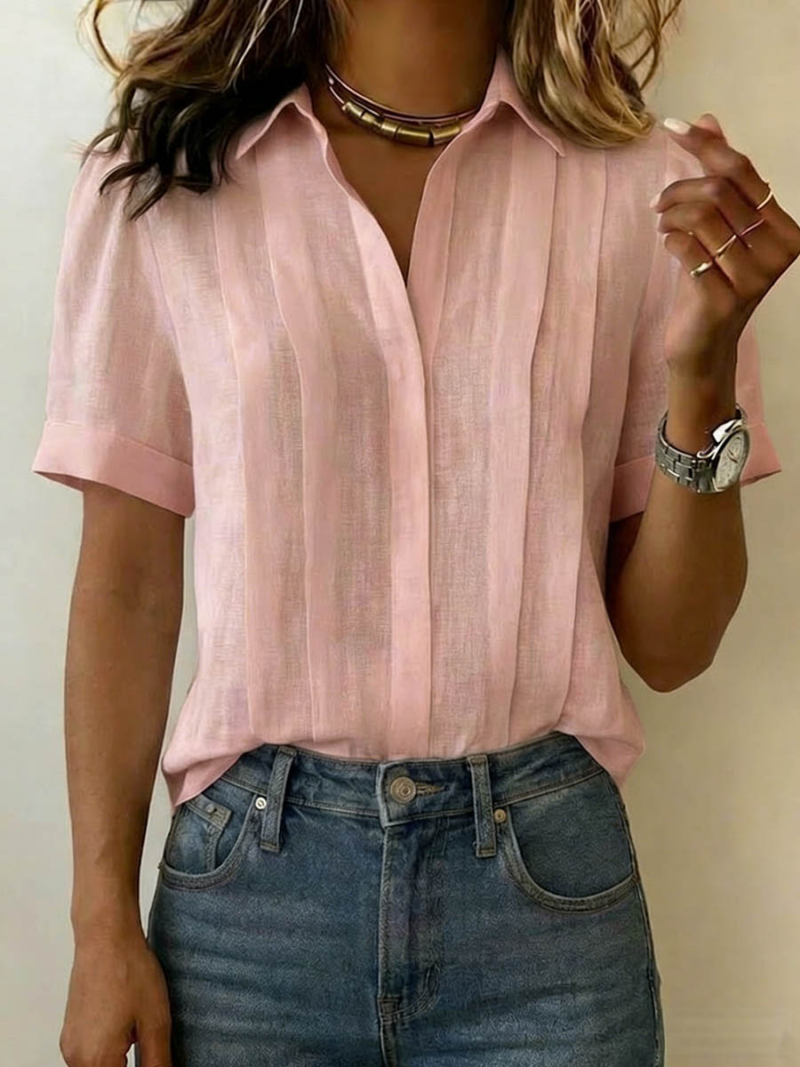 Casual yet chic women's breezy short-sleeve top. Ideal summer fashion blouse for everyday comfort.