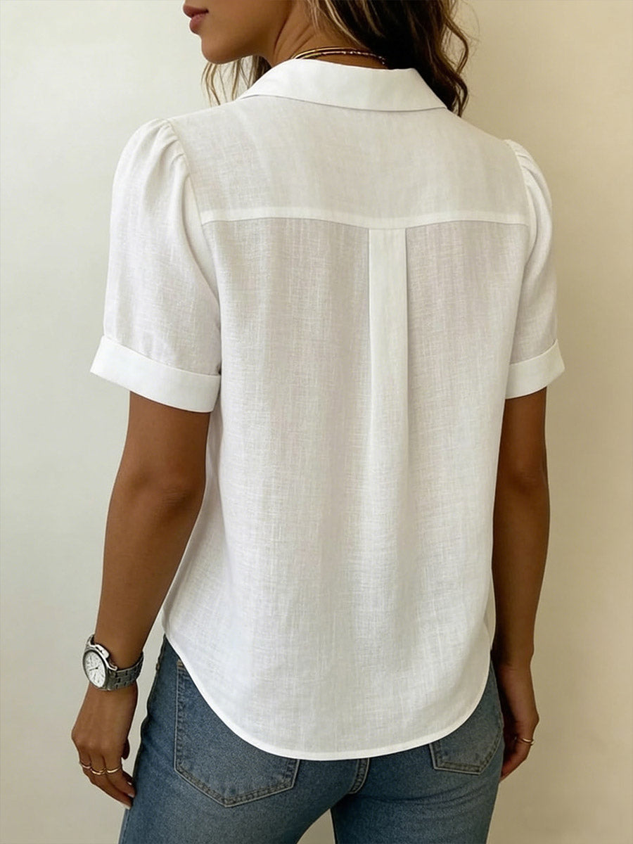 Stylish women's short-sleeve blouse. Breezy & comfortable collared top for summer fashion & work.