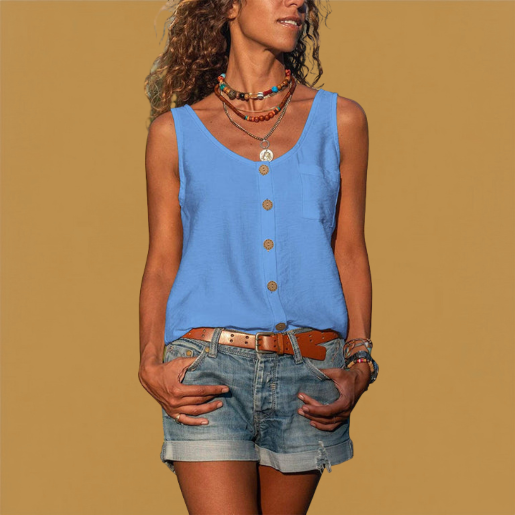 Woman smiling, wearing a relaxed fit breezy sleeveless V-neck button-down top for a casual spring outing.