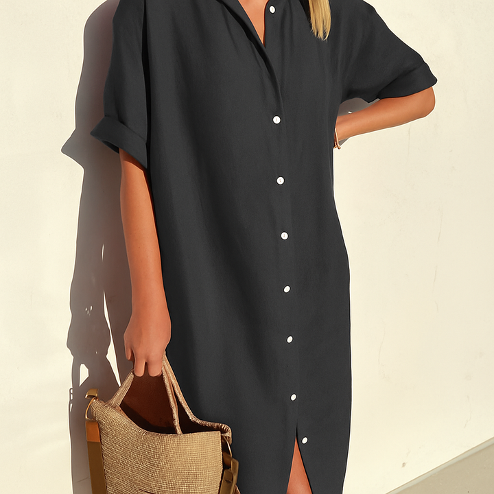 Elegant women's midi shirt dress, versatile for casual day wear or summer outings, featuring a relaxed fit.