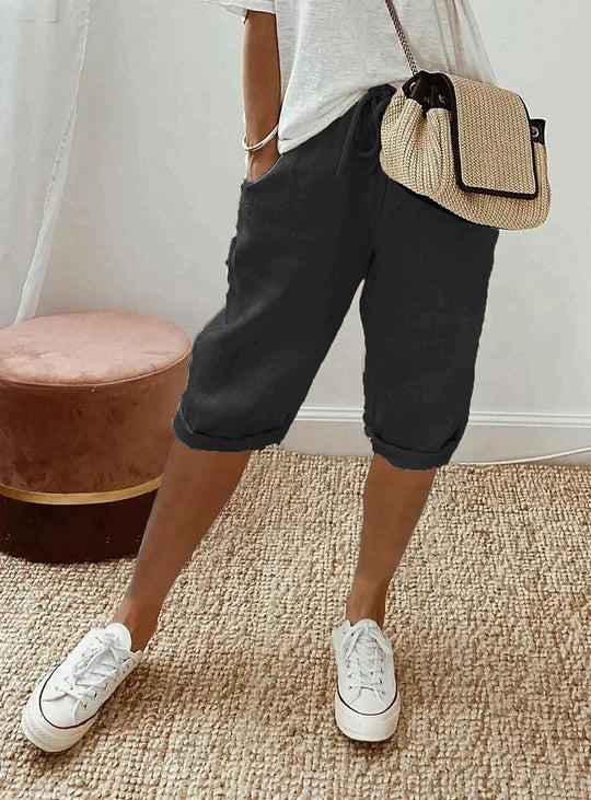 Elegant women's summer pants featuring a breezy wide-leg and elastic waist, ideal for effortless style.