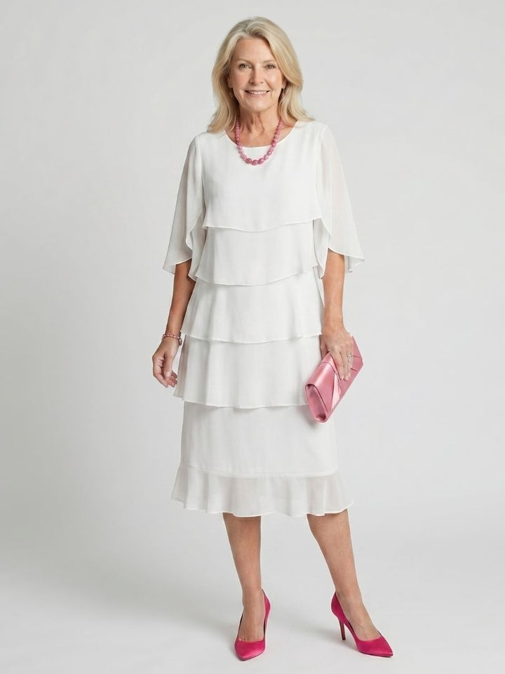 Women's casual layered midi dress in classic black, a comfortable and elegant choice for any season.