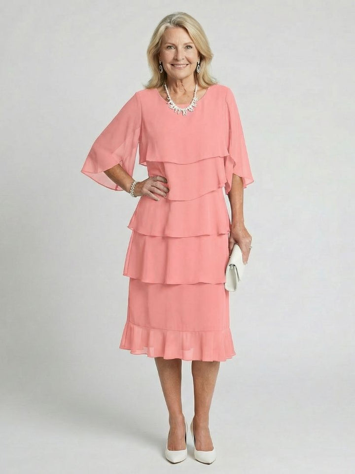 Elegant everyday women's midi dress, featuring a comfortable relaxed fit and stylish tiered layers.