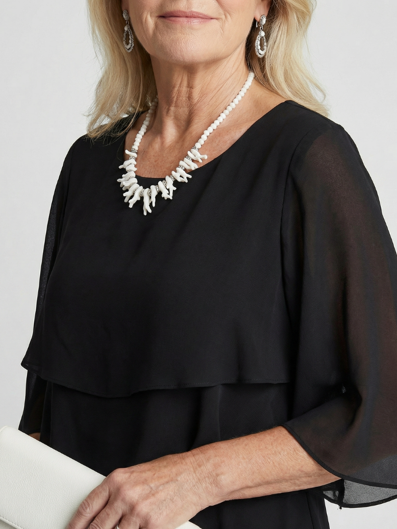 Casual women's Brent midi dress with stylish layers, ideal for everyday elegant wear.