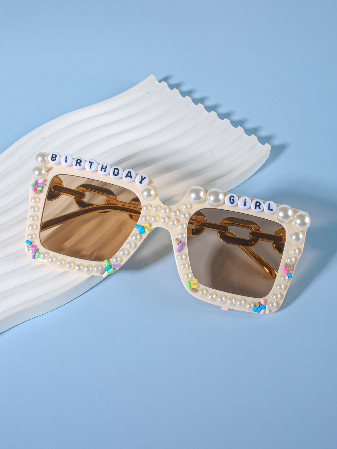Highly decorative women's sunglasses, adding sparkle to any bridal party outfit.