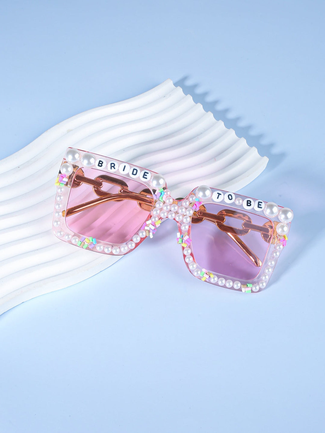 Elegant women's celebration eyewear, perfect for pre-wedding events & festive photos.