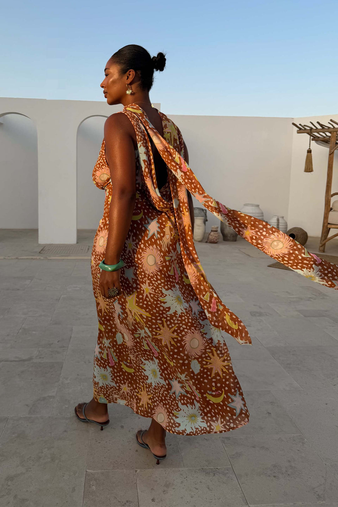 Front view of women's brown fawn print cowl neck halter house dress, elegant and breezy for summer.