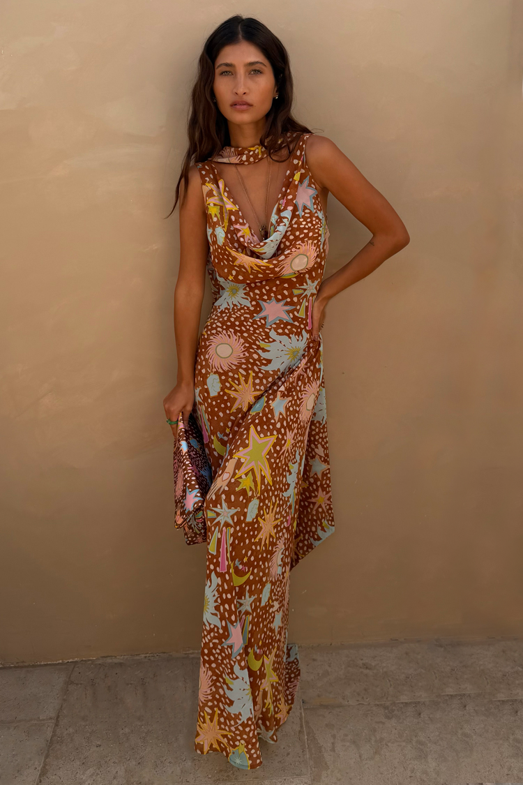 Elegant brown fawn print maxi dress for women, featuring a cowl neck, halter, & low back design.